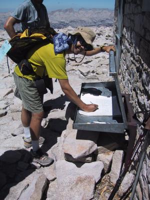 Mount Whitney: Mike signing the register.