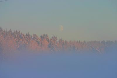 Moon over white landscape