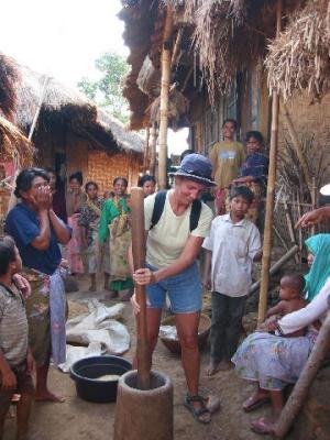 shelling rice while others are making fun of the way I'm doing it