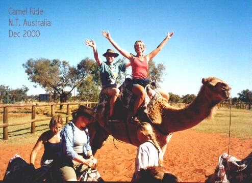 riding a camel somewheres between Alice Springs and Ayers Rock