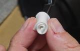 Wet: Pinch one end of the cloth between the straight tweezers