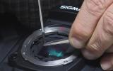 Using the tweezers and screw driver,