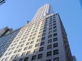 Sidewalk view of the Empire State Building.