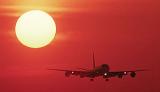 DC8 landing sunset aviation stock photo #SS9934L