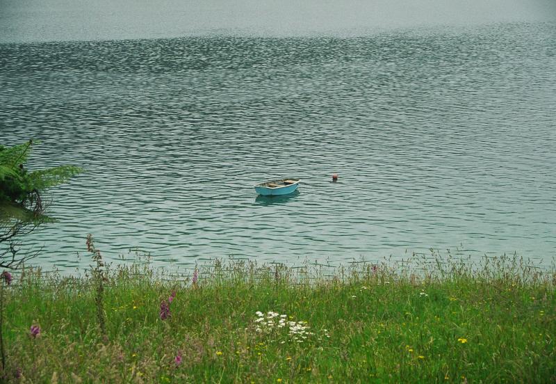 Lonely blue row boat