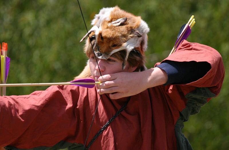Image that all archers wore foxes as hats *