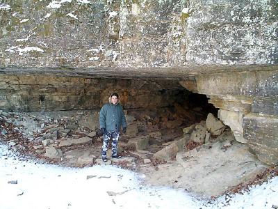 Chris discovers a caveman on his hike.