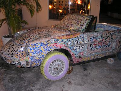 Car covered with tile on Duvall St.JPG