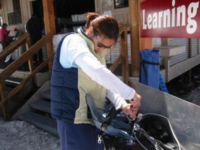 Abby adjusts the bindings