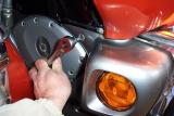 Remove the allen screw on both sides of the lower cowl