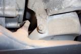 Here is a look at the bolt that hold the overflow reservoir in place