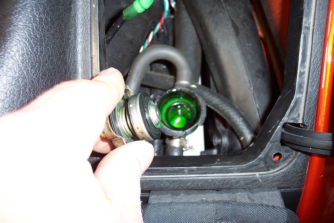 Take the cap off so the fluid can drain