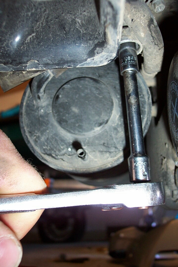 Simply unbolt it with a 8mm socket