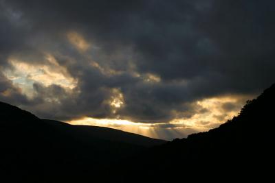 Rays peaking through storm clouds over Highlands.