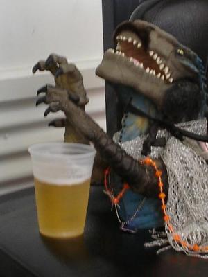 real gay dinosaur hand-puppets drink budwiser!