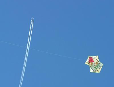 plane trail and kite.jpg