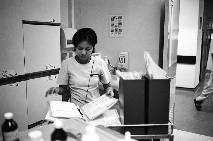 Nurse Completing Shift Report
