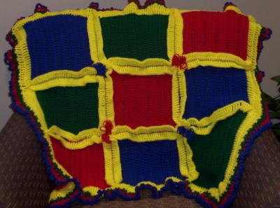 A very unique baby blanket for a baby who's nursery was done in bright primary colors.  This blanket was in my head but did NOT look like this, although this is what it eventually evolved into.  