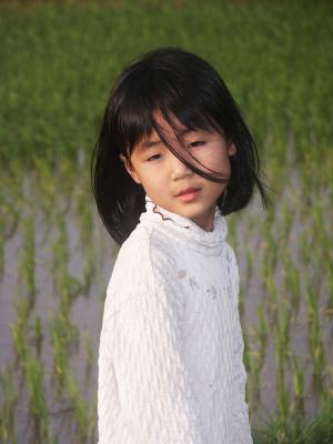 Girl in rice paddy