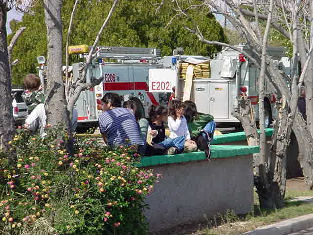 60. fire trucks and bystanders