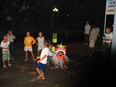 My first night in VN heard all this drumming, must have been some full moon kid's dragon dance practice or something, the moon on the water was really something sitting outside at the ?pub.