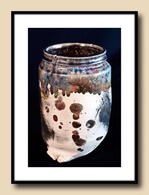 Penny Truitt (early) raku copper glaze, unglazed hand manipulated