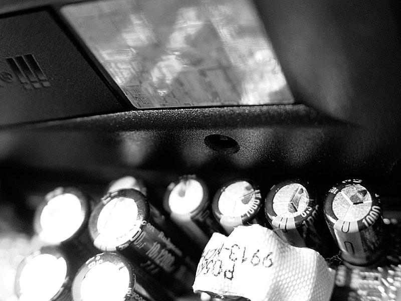 <b>Capacitors</b> <br><font size=-1>by <a href=http://www.howcheng.com/ target=_blank>Howard Cheng</a></font>