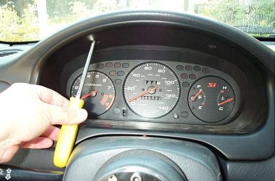 You'll need to tap into the Tach wiring. Start by removing the bezel