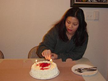 Lynn lights her candles