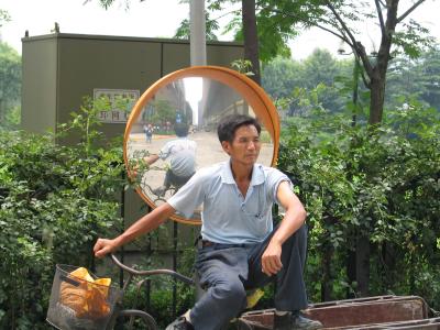 Bicycle Man and Traffic Mirror