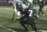 Tony Bartholomew tackling the ball carrier