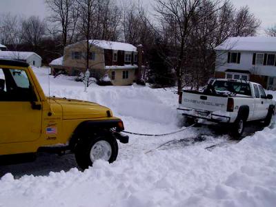 Even the snowplow gets stuck - so the Mighty Yellow Jeep comes to the rescue!!
