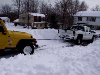 The Jeep pulls out the stuck snowplow - Only In A Jeep!!!