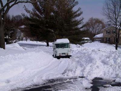 Here comes trouble - the mail truck is not 4WD - only a matter of time before....