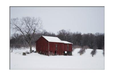 With all that snow, there's not much color except when you can find a nice, red barn!