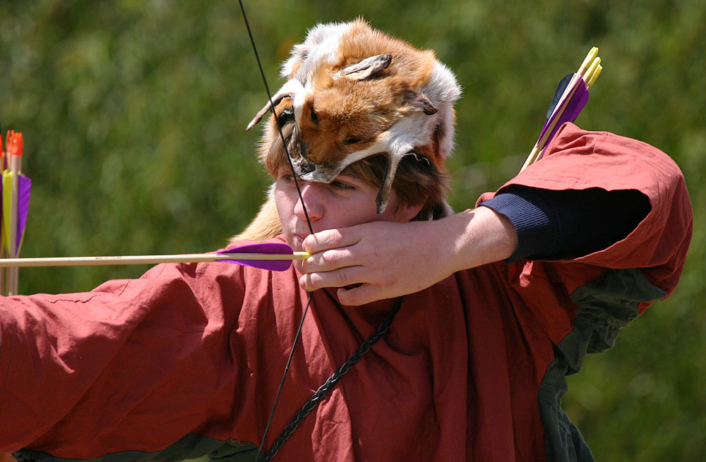Image that all archers wore foxes as hats *