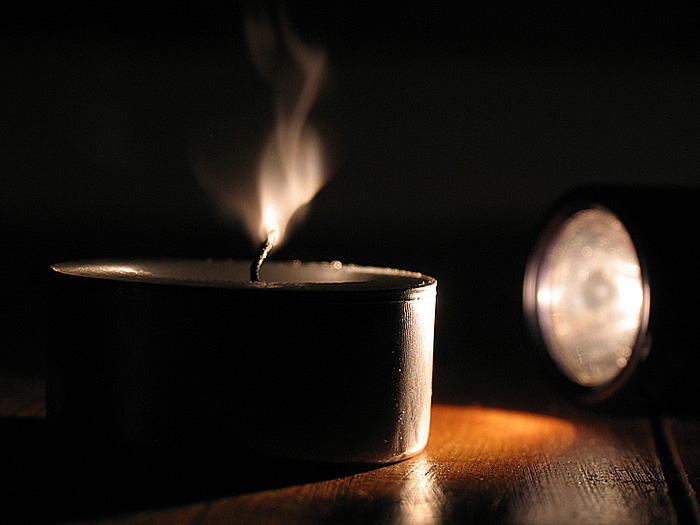 Flashlight blows candle out *.jpg