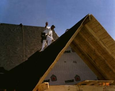 A good night wave - can you believe it? Two men tar papered the complete roof in ONE DAY.