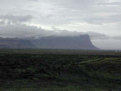 Huge cliff with lava-stones