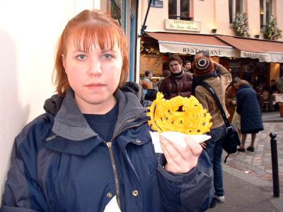 Nicki eating Beignent Miel (deep fried honey donut)