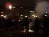 Crazy people lighting fireworks on New Years Eve