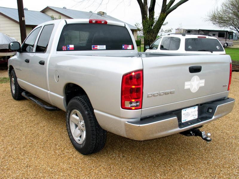 Nerf bars, a hitch, a Hemi, 600 watts, a Freightliner air horn, and 32's. Bring it.