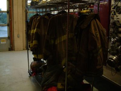 Firefighter gear on rack