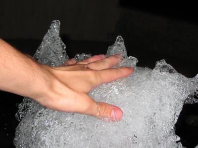my hand on a fountain