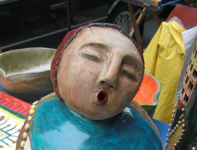 Singing Woman Pottery Figure