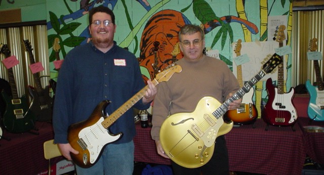 <a href=http://www.jimshine.com>Jim Shine</a> and me (JVR) at the Boston Guitar Show 11/17/02