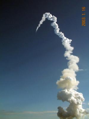 SRB Separation -- The Orbiter Is Visible as a Point of Light