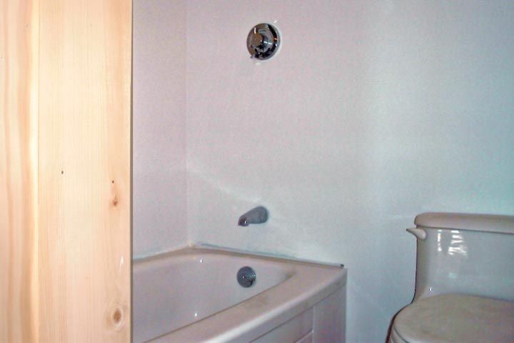 The bathtub - it is white even if it looks beige