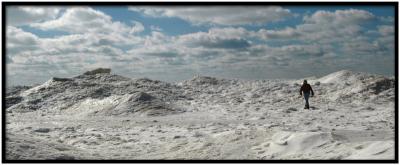 Man on frozen lakebig hills of ice - Lake Michigan