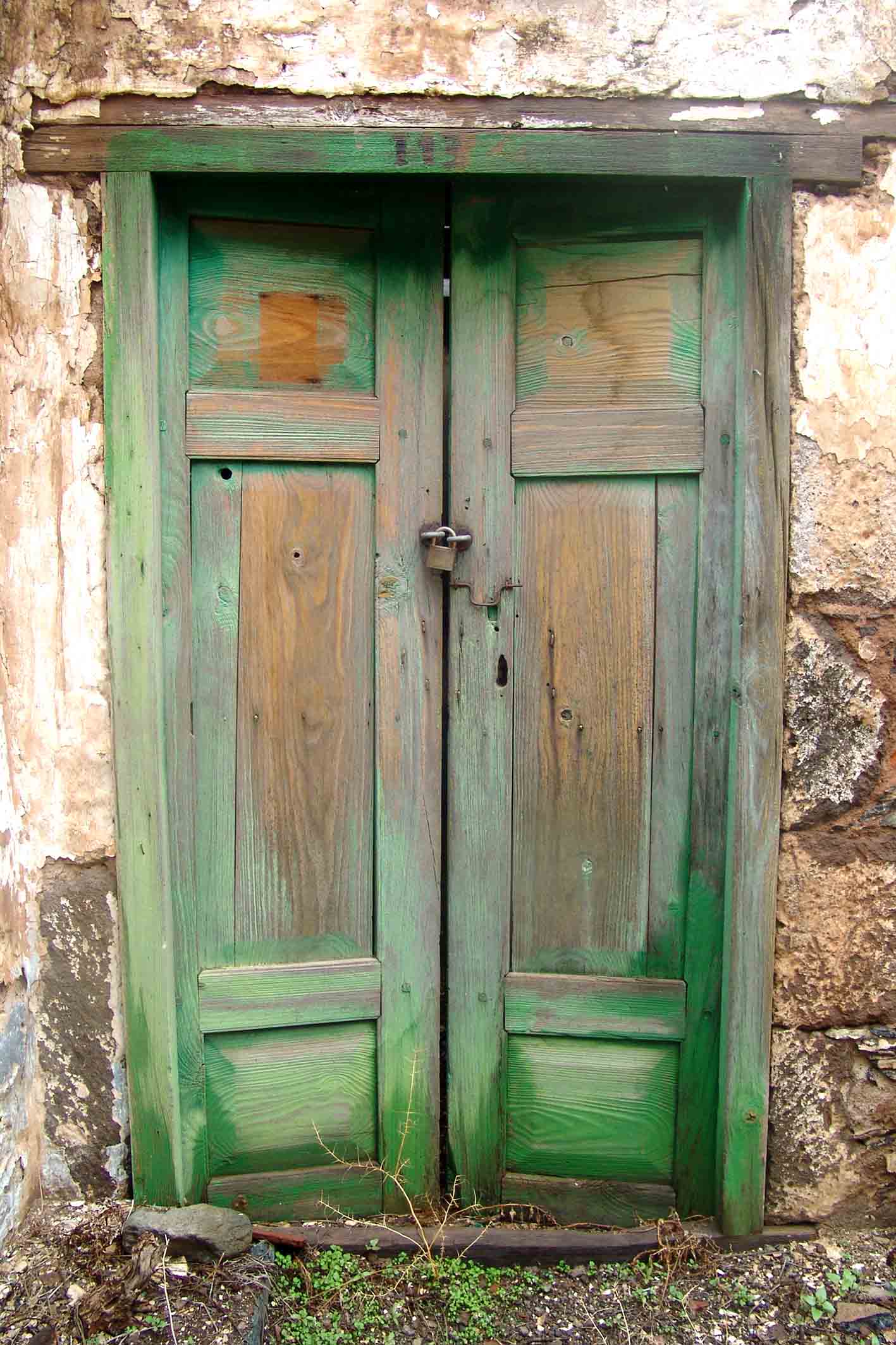 Green door with lock
